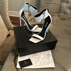 Authentic Versace! White ankle Versace heels. Goes w/everything. Only worn once.